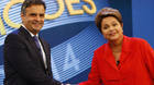 Dilma Rousseff (PT) e Aécio Neves (PSDB) se cumprimentam durante o debate presidencial organizado pela Rede Globo